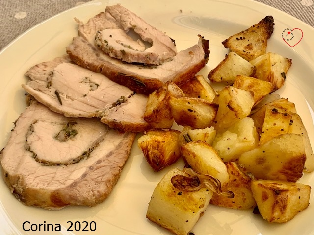 Arista di maiale porchettata con patate e cipolle al forno